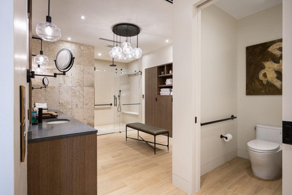 Modern walk-in stone shower and spa bathroom suite in Fisher Island, Miami Beach
