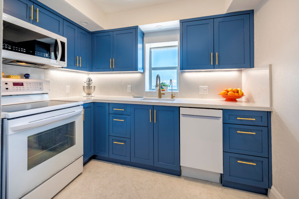 Custom marble backsplash and tailored kitchen cabinetry by Magy Interiors
